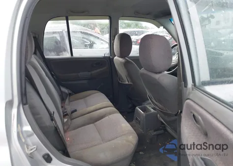 2000 Chevrolet Tracker Hard Top from USA, damaged, VIN 2CNBJ13C1Y6945846